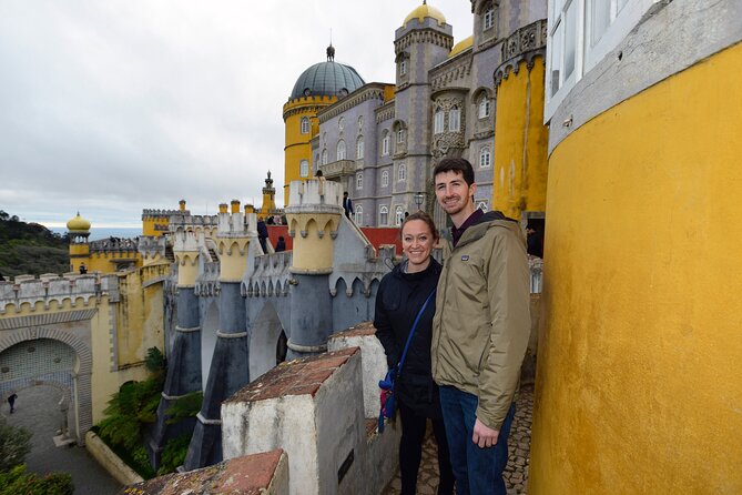 Sintra and Cascais Small Group Tour from Lisbon - Passing the Castle of the Moors for context and viewpoint energy