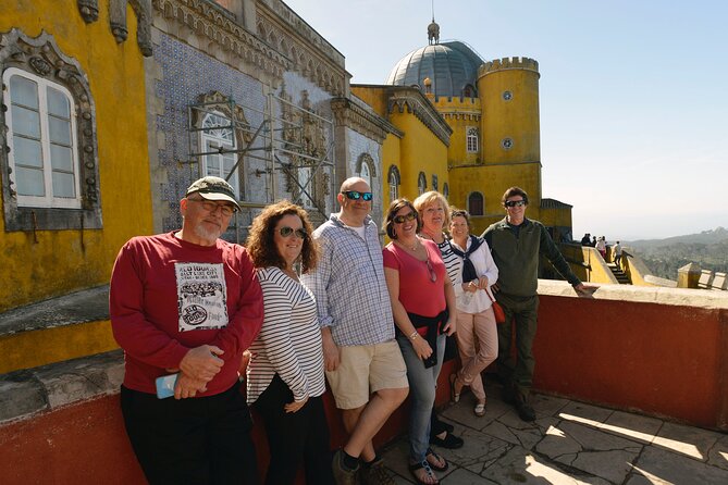 Sintra and Cascais Small Group Tour from Lisbon - Estoril Coast and Guincho Beach: surfers and rugged shoreline
