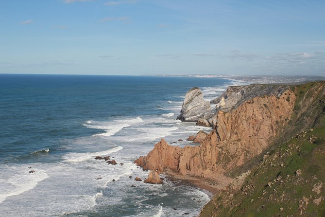 Sintra-Cascais Natural Park by E-Bike: 8- hour Tour from Lisbon - The Sintra palace area, plus that cheesecake moment near the white chimneys