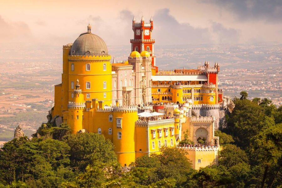 Sintra: Pena Palace, Moorish Castle, Regaleira, & Monserrate - Getting picked up around Lisbon, then straight into the hills