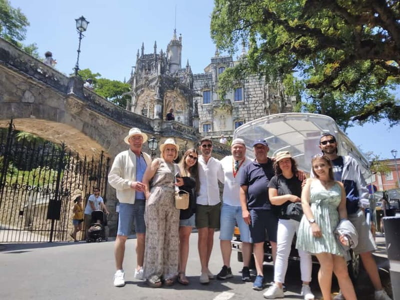 Sintra Tour: Palaces and Dream Landscapes in Tuk Tuk - Starting in Sintra town, with the National Palace in view