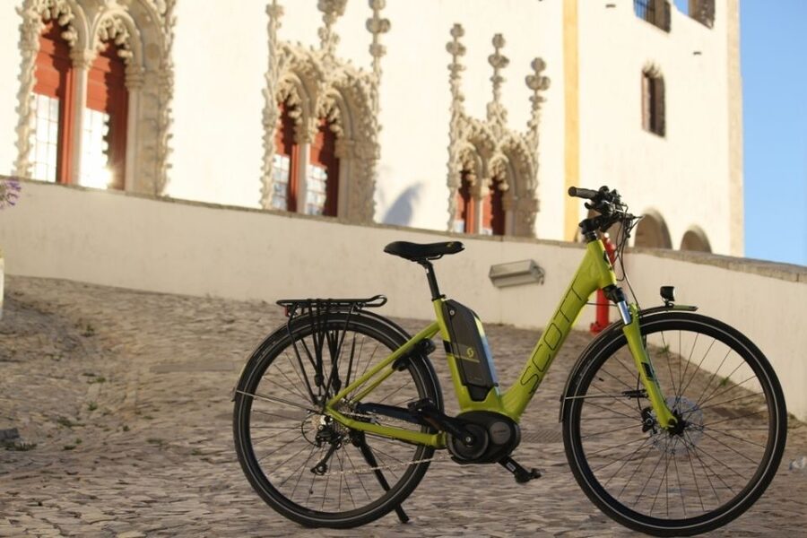 South Lisbon: 3-Hour Christ the King Electric Bike Tour - Casa da Cerca botanic gardens coffee stop, then the sanctuary viewpoint
