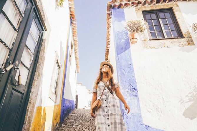 Three Cities in One Day: Porto, Nazare and Obidos from Lisbon - Your guide experience: what varies, what stays consistent