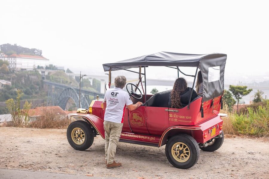 Tour Porto: Classic Adventure in Electric Tuk Tuk - Ribeira streets and Douro River views you can feel