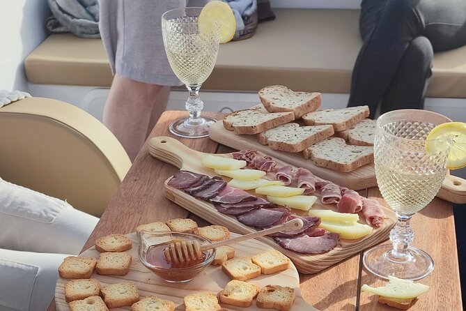 Wine Venture and Boat Trip in Douro Valley from Porto - The Bagaúste electric boat hour: views with snacks and calm